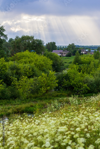 Wallpaper Mural Countryside landscape with bright sunrays break through the clouds Torontodigital.ca