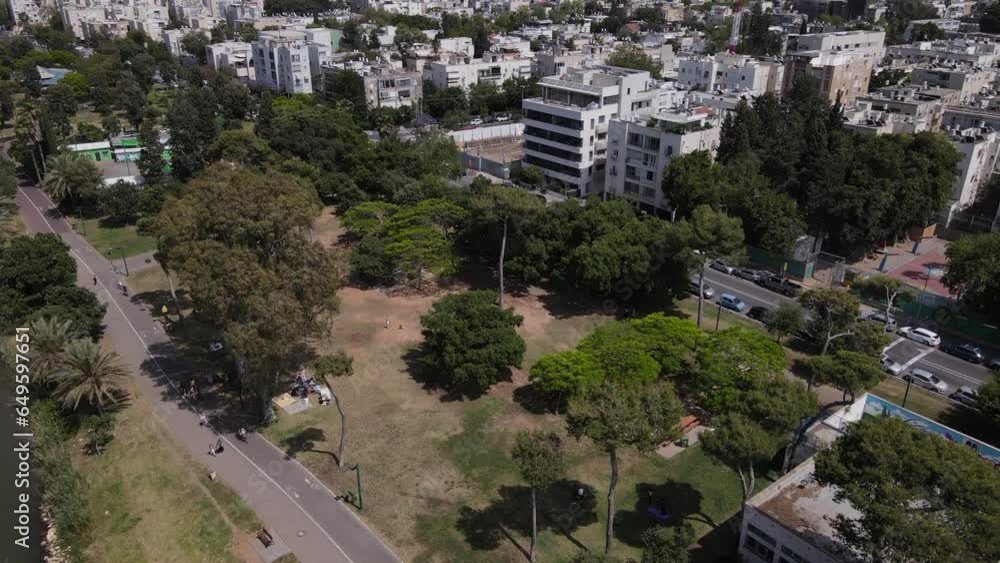 City park on the edge of large city with skyscrapers, Tel Aviv, Israel City park on the edge of large city with skyscrapers, Tel Aviv, Israel