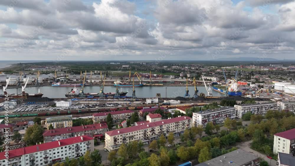Aerial view of Georgian port city of Poti located at entrance of Rioni river into Black Sea on sunny autumn day, Samegrelo-Zemo Svaneti region. Aerial view of Georgian port city of Poti located at entrance of Rioni river into Black Sea on sunny autumn day, Samegrelo-Zemo Svaneti region.