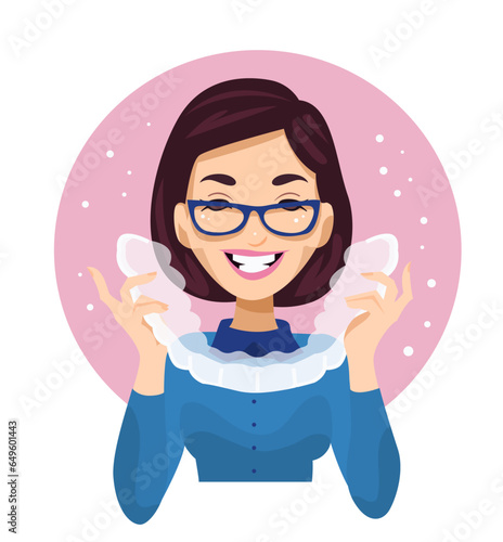 Woman holding big aligner. Orthodontic silicone trainer.