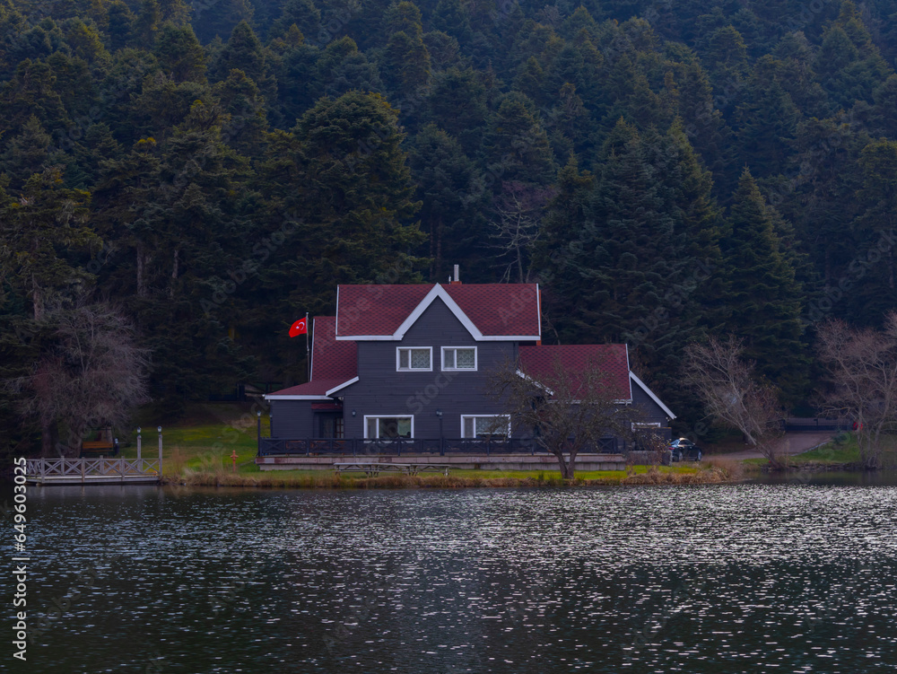 Bolu Golcuk Lake and famous house view with reflections. Bolu Golcuk Lake and famous house view with reflections.