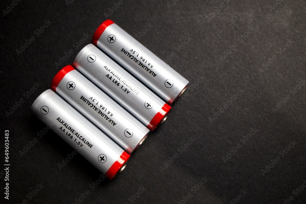 Alkaline Double A, AA batteries 1.5V, positive and negative, grey and