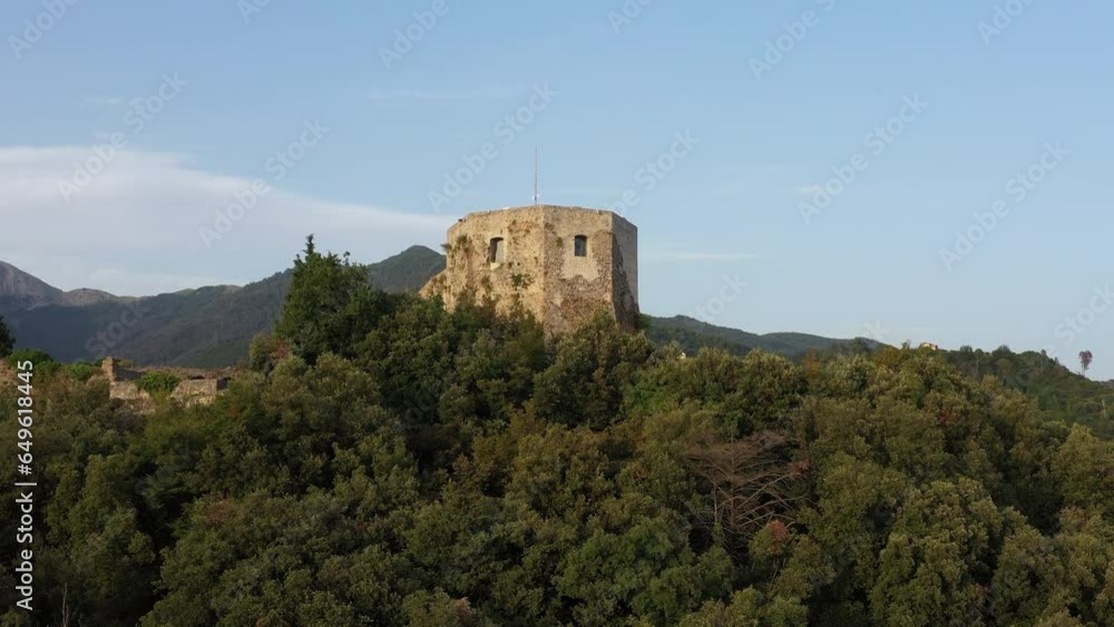 ruins and a tower with an observation deck and panoramic views of the Montignoso Province of Massa and Carrara. Aginolfi Castle dominates the town of Montignoso. Aghinolfi Castle on top of a hill.
