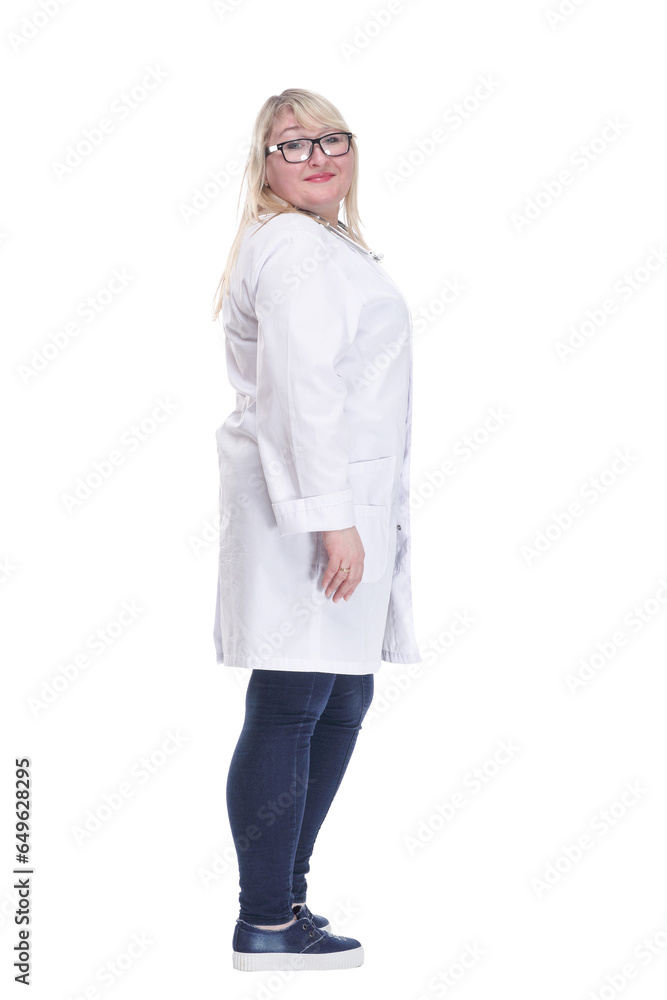 Mature female doctor with a stethoscope looking at a white screen. Mature female doctor with a stethoscope looking at a white screen.