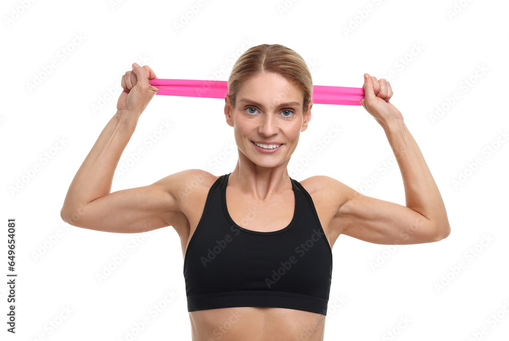 Woman exercising with elastic resistance band on white background