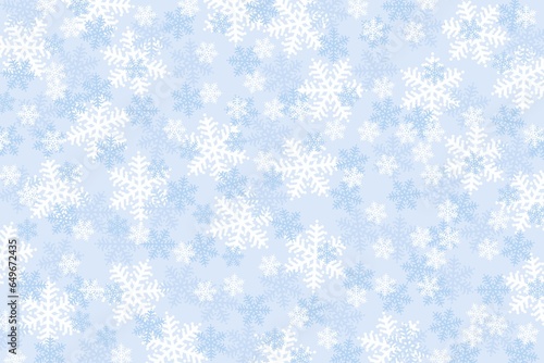 White and light blue snowflakes on light blue background, different shades and sizes of snowflakes, decorative pattern of the background. Christmas or winter motif.