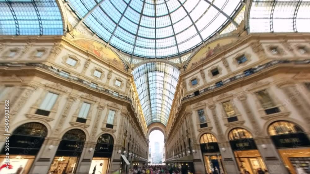 Motion timelapse of people at the historic Gallery of Vittorio Emanuele II at Piazza del Duomo in Milan, Italy. 