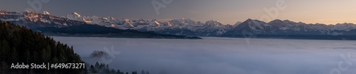 Panorama Swiss Alps with fog sea