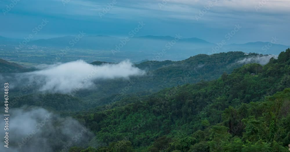 Timelapse Mountain landscape foggy winndy range mountain green landscape asian farm. Beautiful landscape mountain green field meadow white cloud blue sky on sunrise. Countryside sun light heaven Timelapse Mountain landscape foggy winndy range mountain green landscape asian farm. Beautiful landscape mountain green field meadow white cloud blue sky on sunrise. Countryside sun light heaven