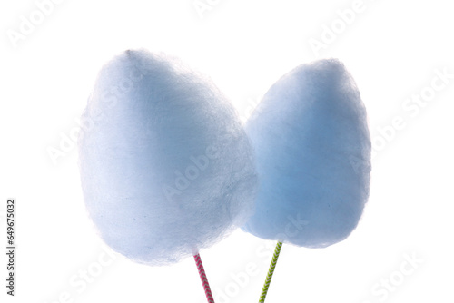 Sticks with yummy cotton candy isolated on white