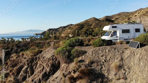 Aerial view. Camper rv camping on cliff sea shore. Mediterranean region of Villaricos, Almeria, eastern Andalusia, Spain.