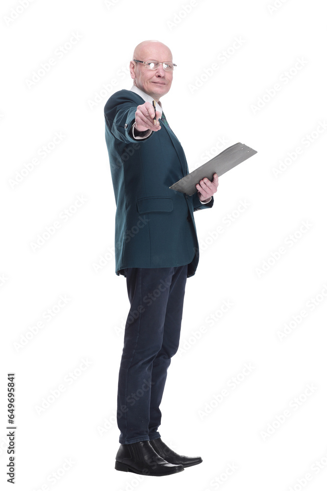 serious business man writing something in the clipboard. serious business man writing something in the clipboard.
