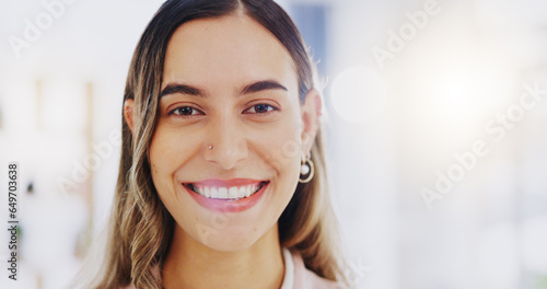 Face, smile and business woman in office with pride for career, job or occupation in corporate workplace. Portrait, happiness and female entrepreneur, professional or confident person from Greece.