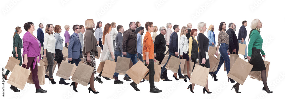 a group of people are running paper shopping bags