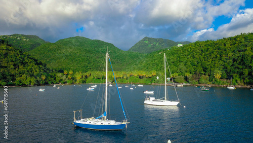 White Boats and Yachts in the Green Lagoon of Guadeloupe Island, Caribbean islands © Dave