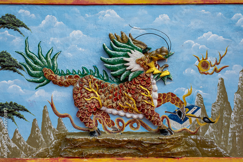 Chinesse Dragon ornament on the wall at vihara senggarang, tanjungpinang