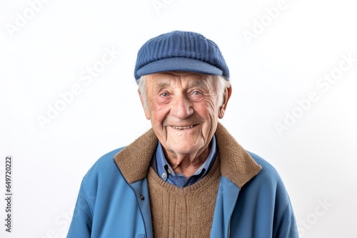 portrait of a confident Polish man in his 90s wearing a chic cardigan against a white background