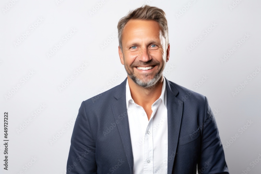 medium shot portrait of a happy Polish man in his 40s wearing a chic cardigan against a white background medium shot portrait of a happy Polish man in his 40s wearing a chic cardigan against a white background