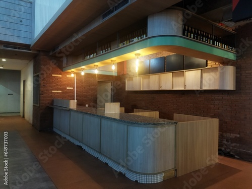 Rustic kitchen bar with warm lighting (ID: 649737003)