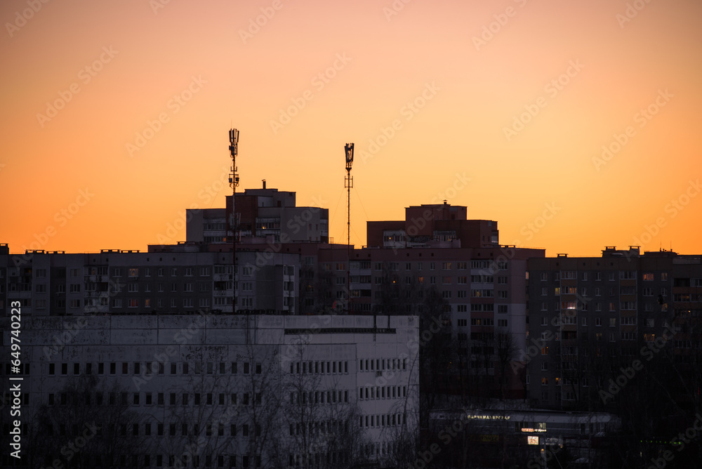 A soviet building on sunset in evening in winter