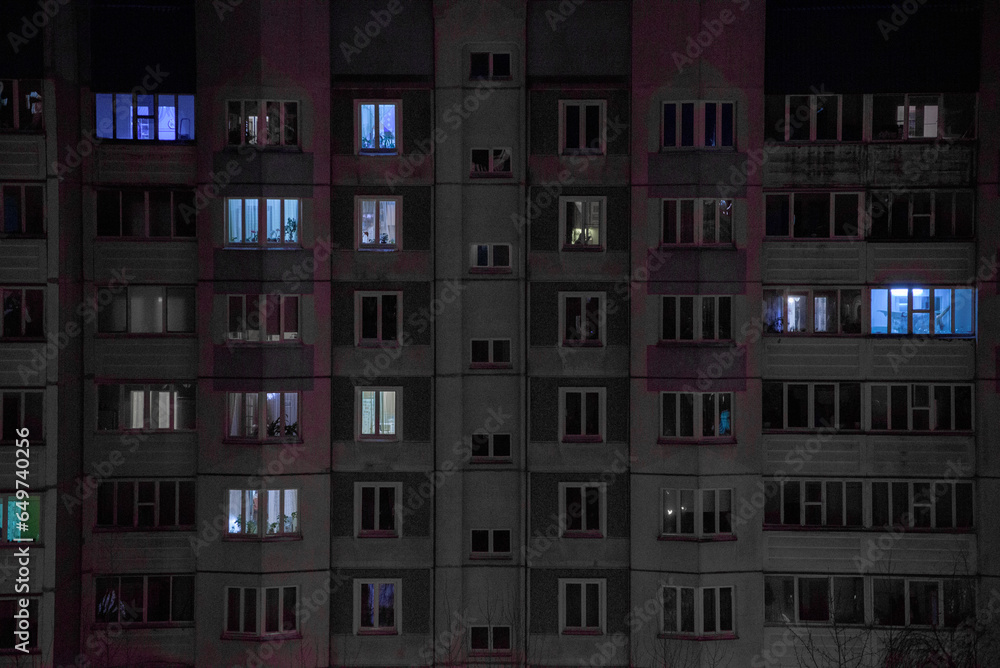 A soviet building in the city in evening in winter
