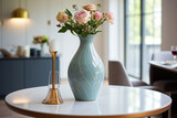 Ceramic with beautiful flowers on table in modern kitchen. Interior design