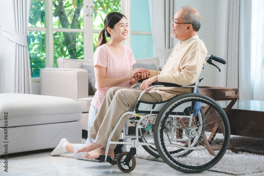 Asian family health care and insurance business at home concept, woman daughter take care support to senior elderly father patient in wheelchair together, dad having smile in happy love lifestyle Asian family health care and insurance business at home concept, woman daughter take care support to senior elderly father patient in wheelchair together, dad having smile in happy love lifestyle