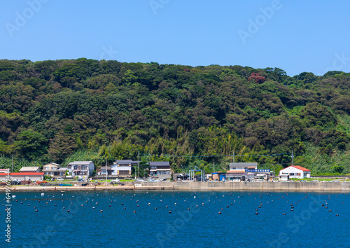 Fishermen houses on the seaside, Ainoshima Island, Shingu, Japan photo