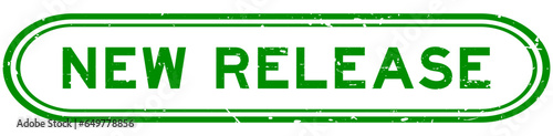 Grunge green new release word rubber seal stamp on white background
