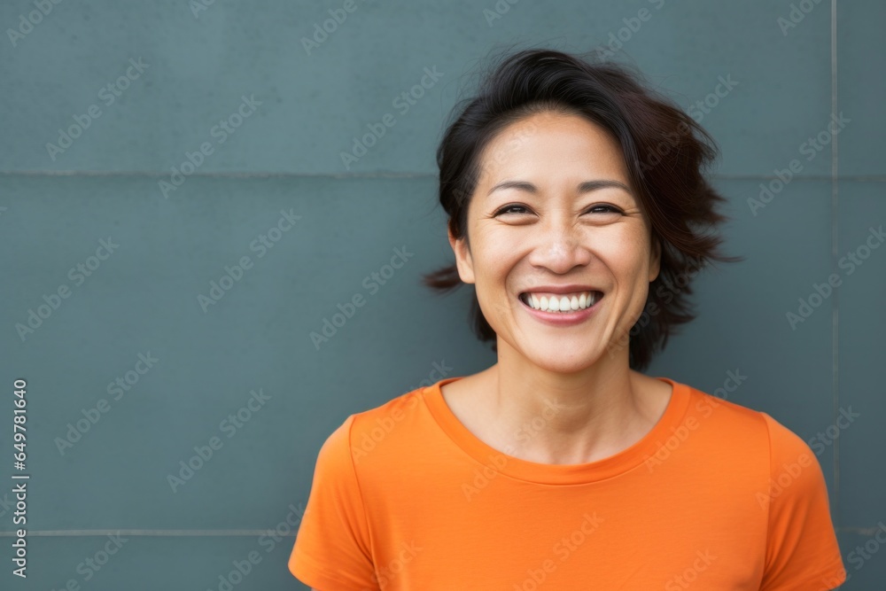 Cheerful mature woman with joyful smile and gaze, front view portrait Cheerful mature woman with joyful smile and gaze, front view portrait