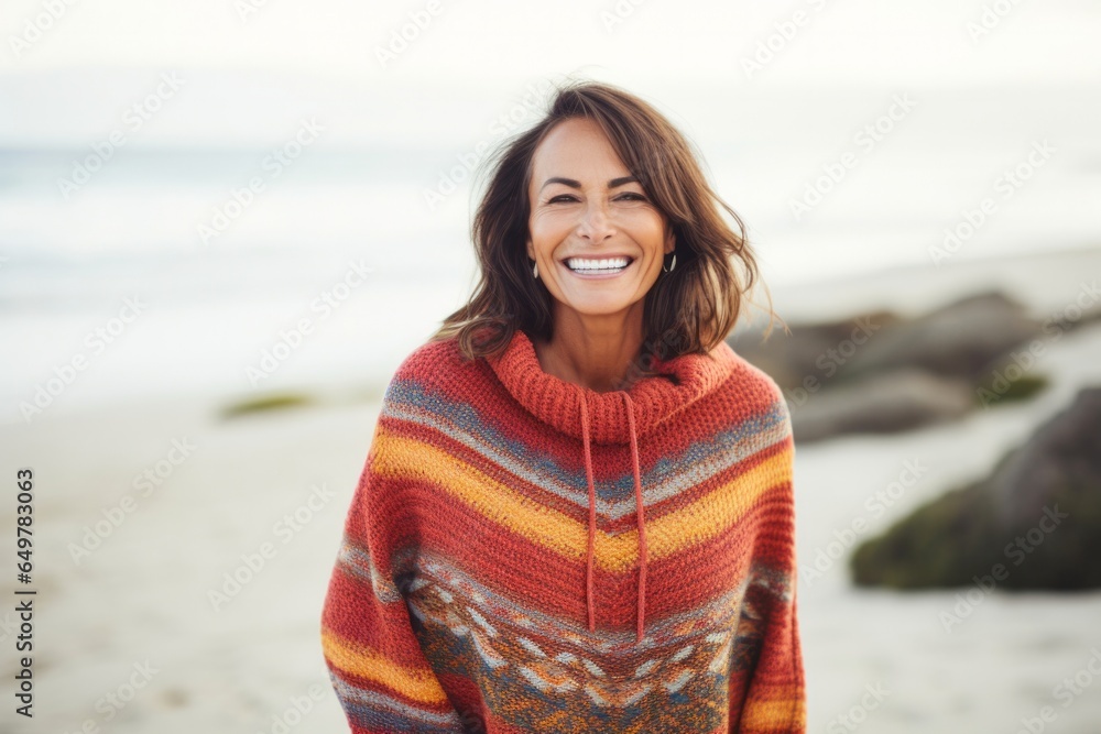 Cheerful woman with brown hair smiling at camera on winter vacation Cheerful woman with brown hair smiling at camera on winter vacation