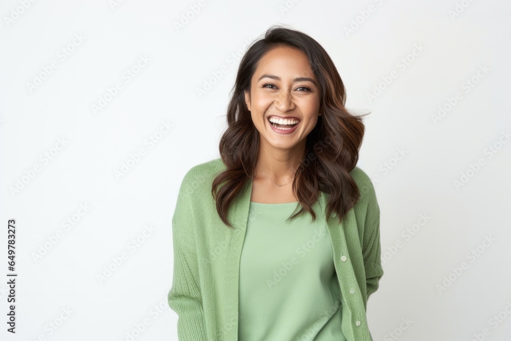 Cheerful woman with curly hair smiling towards camera on white background Cheerful woman with curly hair smiling towards camera on white background