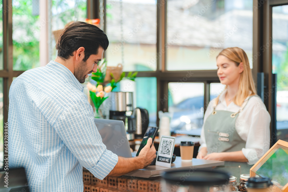 Customer using smartphone to scan QR code for order menu in cafe restaurant with digital delivery, Choose menu and order accumulate discount, E wallet technology to pay online, credit card or bank app Customer using smartphone to scan QR code for order menu in cafe restaurant with digital delivery, Choose menu and order accumulate discount, E wallet technology to pay online, credit card or bank app
