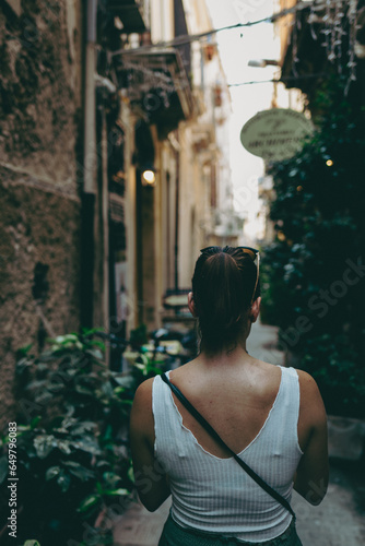 Young women walking through some narrow streets. Exploring. Holidays. Enjoying Life. Travel. 