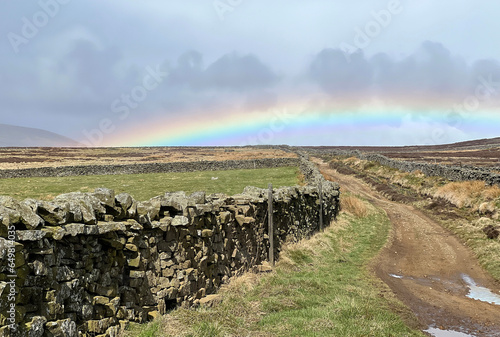 Rainbow over a yorkshire dale path