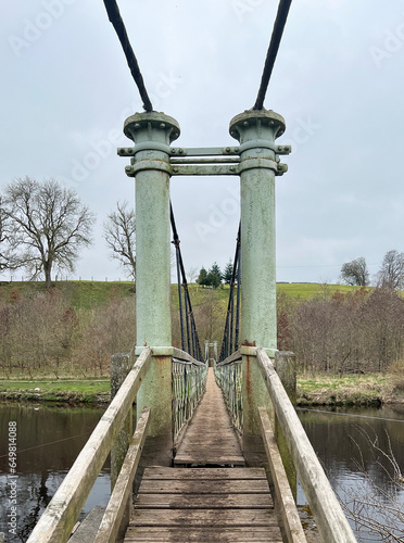 suspension footbridge over river