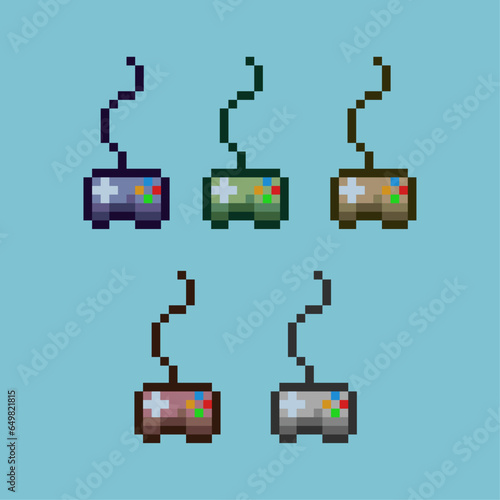 Pixel art sets of controller from top down with variation color item asset. simple bits of controller on pixelated style 8bits perfect for game asset or design asset element for your game design asset