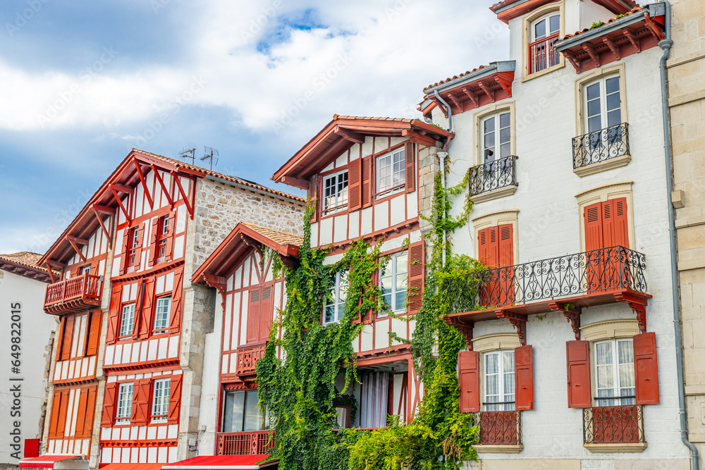 Typical red and white basque houses in Ciboure, France 