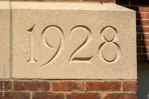 Fototapeta Concrete block, 1928 building cornerstone.