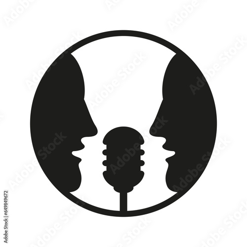 Two men sing a song into a microphone.