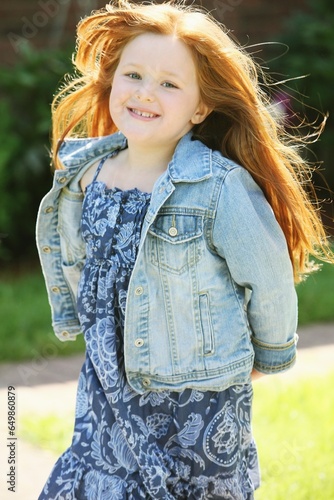 Portrait Of A Girl With Long, Red Hair; Troutdale, Oregon, United States Of America photo