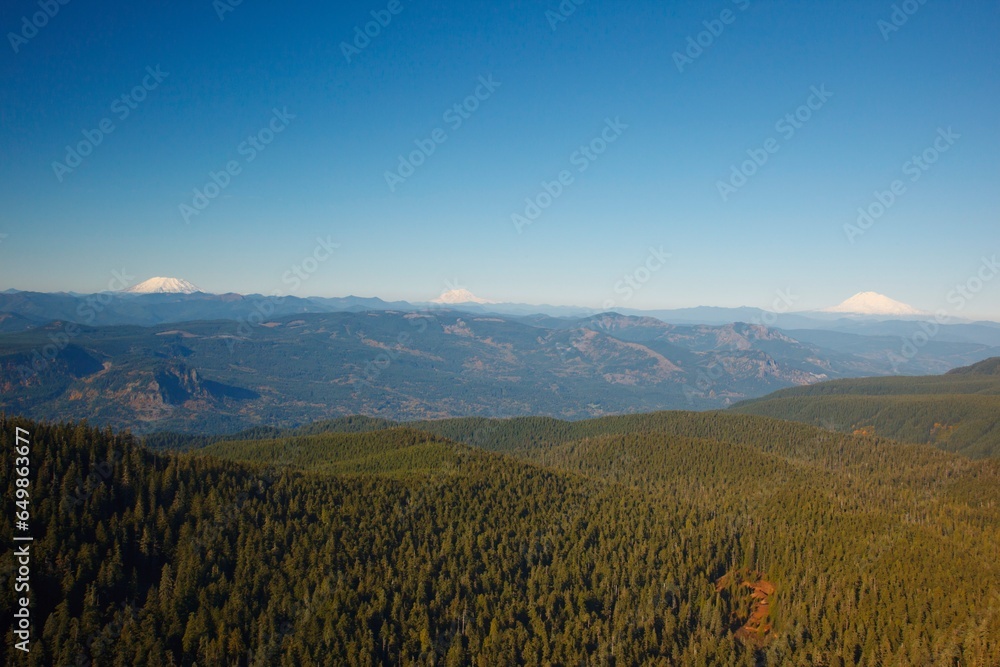 View Of Mount Saint Helens, Mount Rainier And Mount Adams From Larch Mountains; Oregon, United States Of America