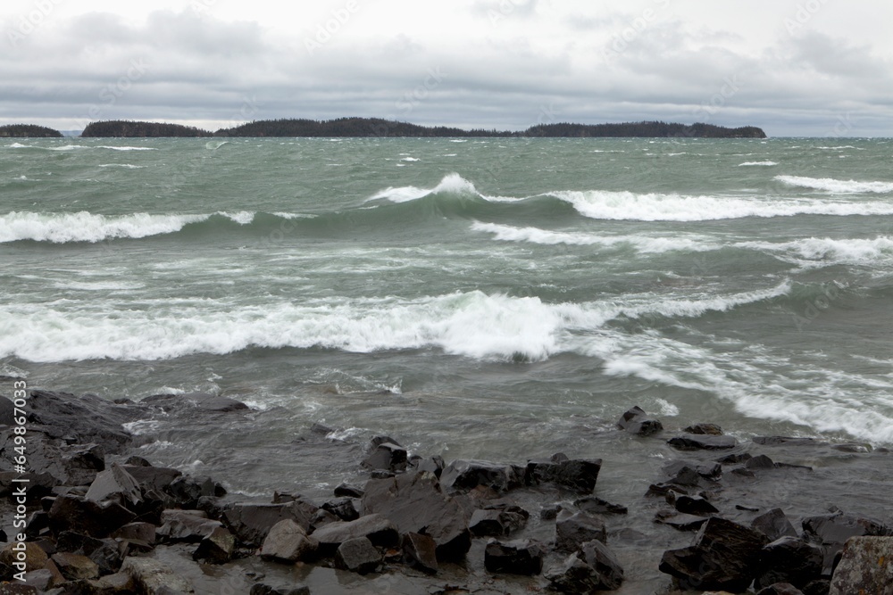 Crashing Waves On The Rocky Shoreline Of Lake Superior; Thunder Bay, Ontario, Canada Crashing Waves On The Rocky Shoreline Of Lake Superior; Thunder Bay, Ontario, Canada