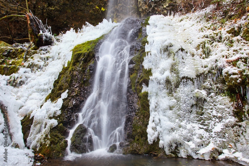First Winter Snow Along Cabin Creek Falls In Columbia River Gorge National Scenic Area; Oregon, United States Of America First Winter Snow Along Cabin Creek Falls In Columbia River Gorge National Scenic Area; Oregon, United States Of America