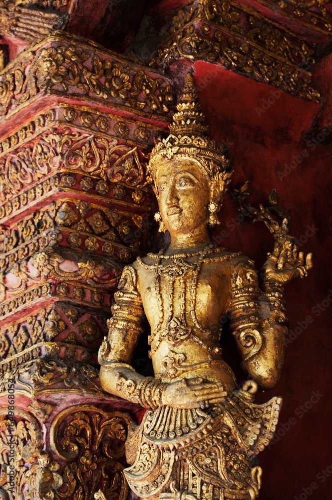 Statue In Wat Phra Singh Temple; Chiang Mai, Thailand