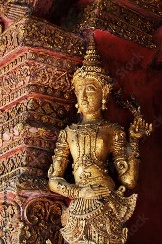 Statue In Wat Phra Singh Temple; Chiang Mai, Thailand
