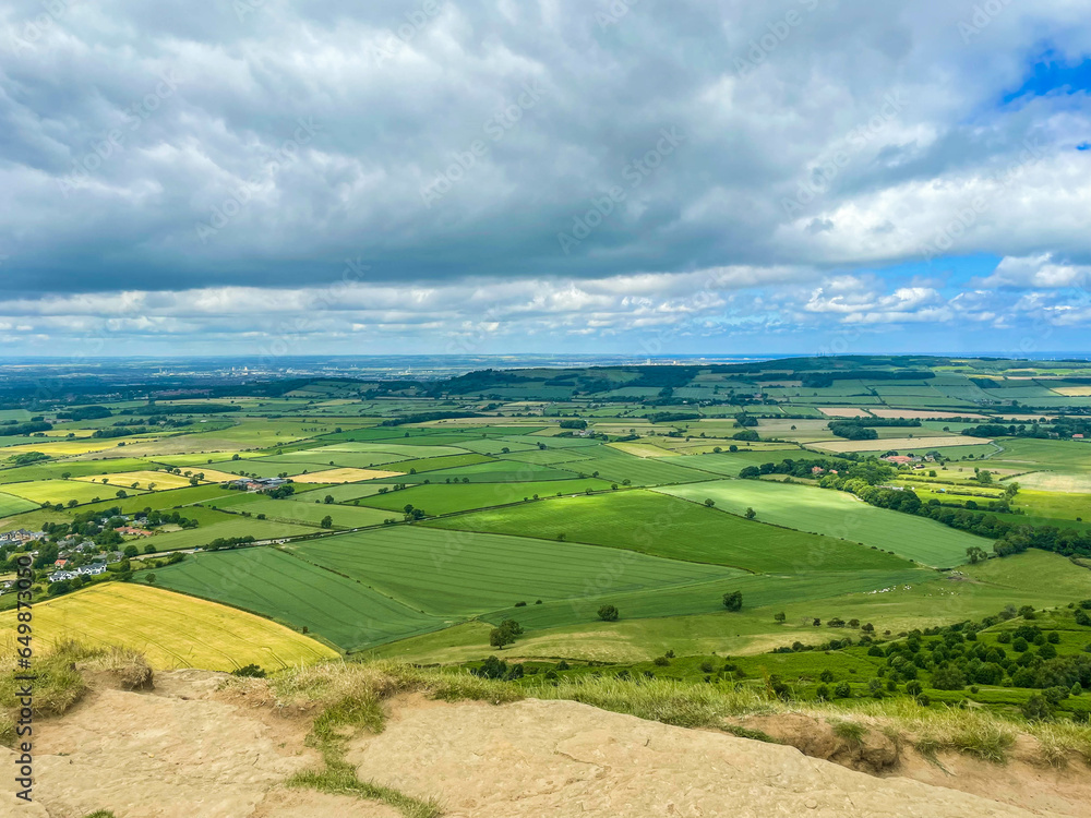 Fototapeta premium Green landscape with hills and trees