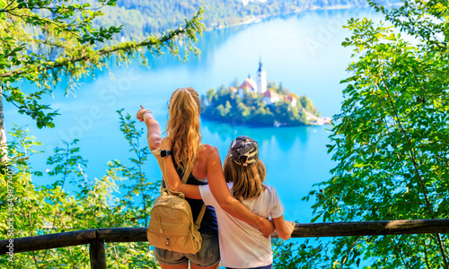 Mother and son enjoying panoramic view of Bled lake in Slovenia- travel, tour tourism, vacation in Europe