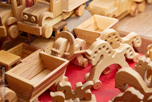 close-up wooden toys stand in the store on the table