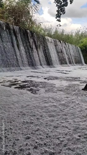 a river in the middle of a beautiful canyon